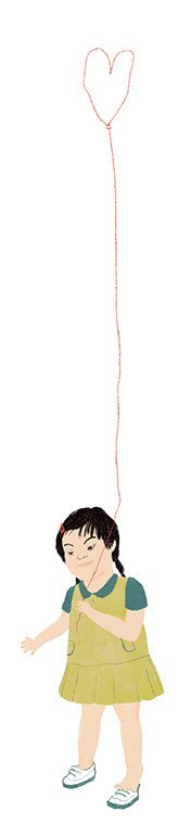 Girl with heart shaped baloon